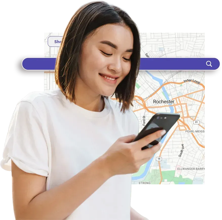 Woman uses her mobile device over the backdrop of MyWayfinder's search bar and map.